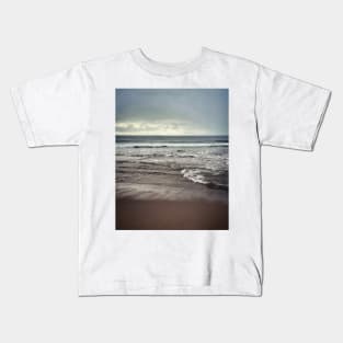 Stormy beach Kids T-Shirt